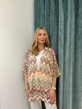 Not Shy Ikat Cape in Hennie